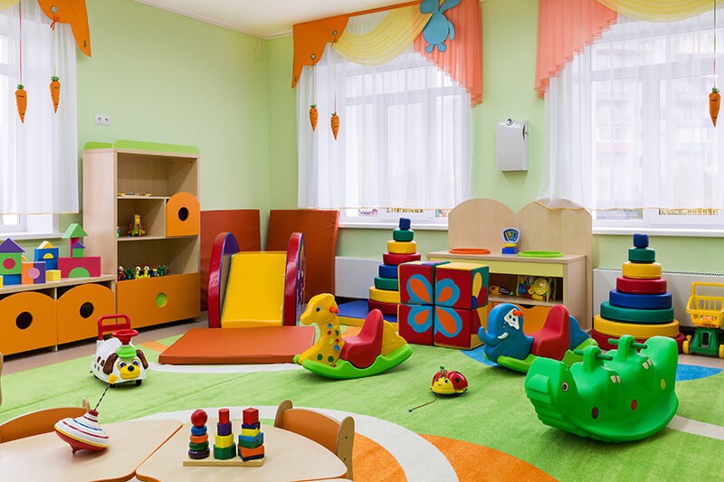 A room with toys and a play set.