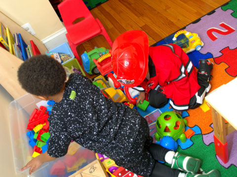 Children busy in playing with a number of toys